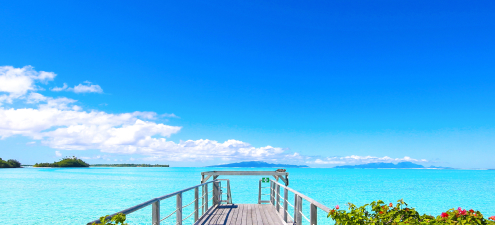 Ocean view from a luxurious Sandals island resort, representing the prize for Zown's all-inclusive trip giveaway