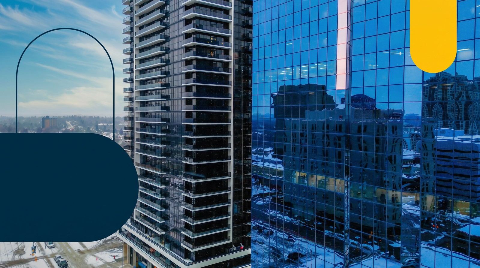 A modern glass condo tower rising over a city street in Ontario