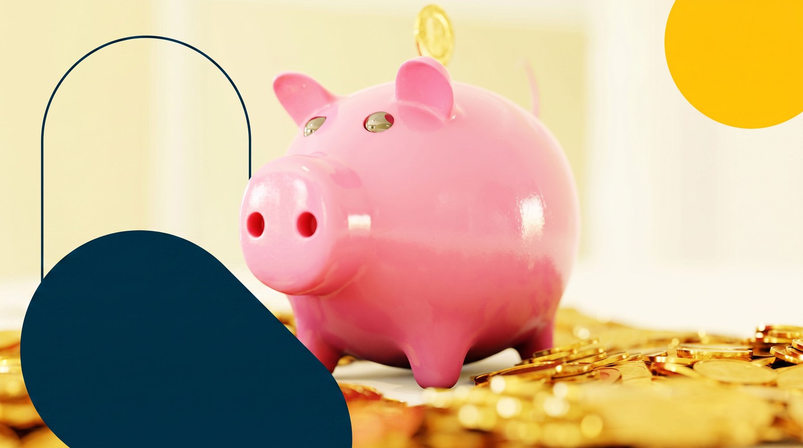 A pink piggy bank sitting on a pile of gold coins