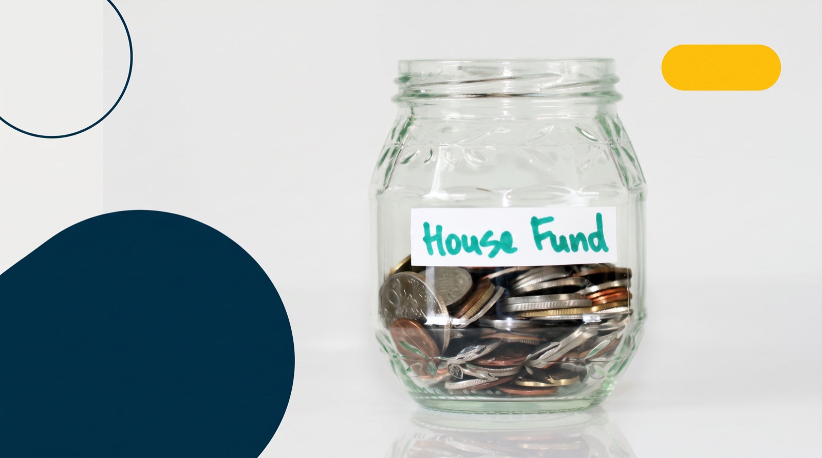 A glass jar labelled "House Fund" filled with coins, illustrating saving for a first home with a First Home Savings Account (FHSA) in Ontario.